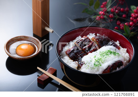 Eel and grated yam rice bowl is packed with nutritional value with fluffy grated yam and eel! 121708891