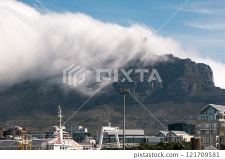Cape Town cityscape, buildings and Table Mountain in clouds 121709581