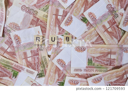 Background of five thousand Russian ruble banknotes with inscription RUB Background of five thousand Russian ruble banknotes with inscription RUB 121709593