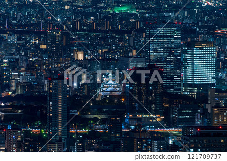 Osaka night view and illuminated Osaka Castle 121709737