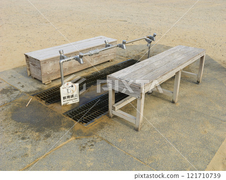 Foot washing area at the beach 121710739