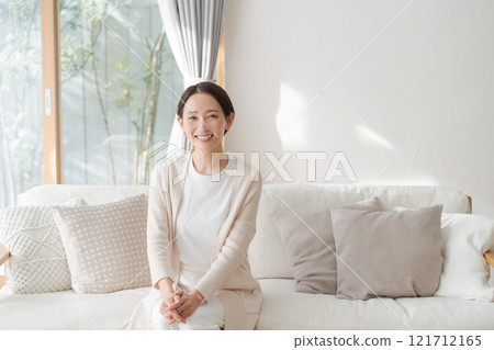 Middle aged woman Middle aged woman 121712165