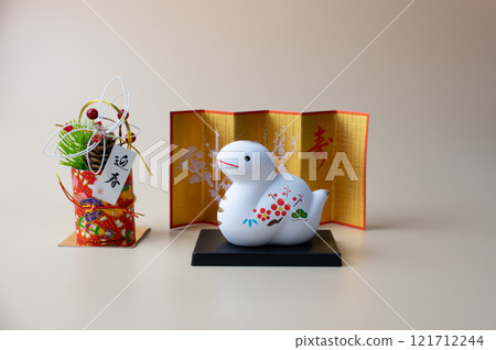 A figurine of a snake, one of the twelve Chinese zodiac animals, celebrating the New Year A figurine of a snake, one of the twelve Chinese zodiac animals, celebrating the New Year 121712244