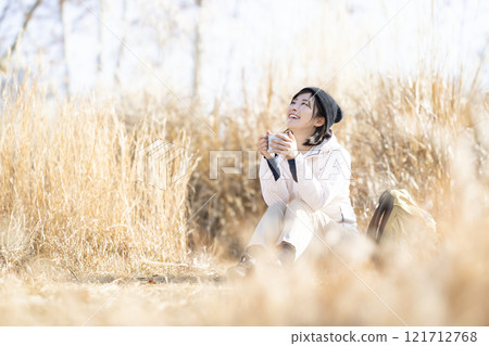 Woman enjoying hiking Woman enjoying hiking 121712768