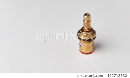 Water faucet-axle box with ceramic plates on a c background close-up macro photography 121712880