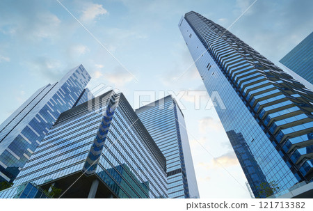 Modern skyscrapers reaching for the sky in singapore's business district Modern skyscrapers reaching for the sky in singapore's business district 121713382