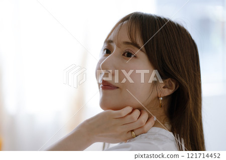 Young woman with long black hair Young woman with long black hair 121714452