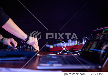Audio Mixing Console in a Recording Studio with advanced sound production capabilities Audio Mixing Console in a Recording Studio with advanced sound production capabilities 121714556