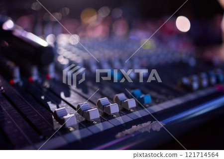 This is a professional audio mixing console that features colorful faders for enhanced usability 121714564
