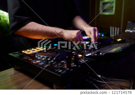 Audio Mixing Console in a Recording Studio with advanced sound production capabilities Audio Mixing Console in a Recording Studio with advanced sound production capabilities 121714576