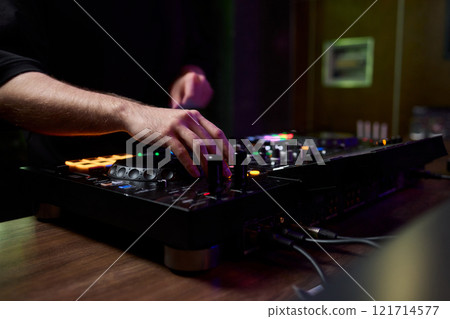 Audio Mixing Console in a Recording Studio with advanced sound production capabilities Audio Mixing Console in a Recording Studio with advanced sound production capabilities 121714577