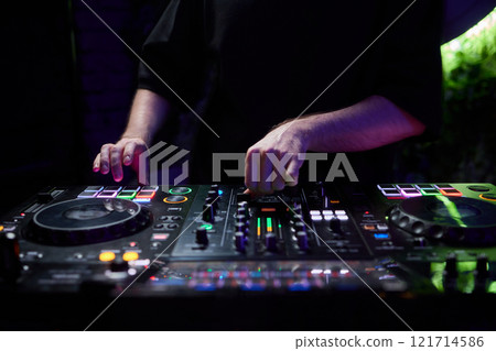 Audio Mixing Console in a Recording Studio with advanced sound production capabilities Audio Mixing Console in a Recording Studio with advanced sound production capabilities 121714586