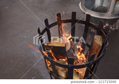 A stunning, scenic flame within an outdoor fire pit beautifully captured in high detail today 121715040