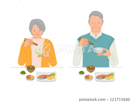 Smiling senior couple set having a meal Smiling senior couple set having a meal 121715680