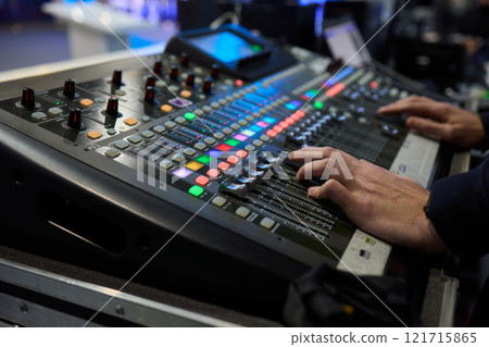 This is a professional audio mixing console that features colorful faders for enhanced usability 121715865