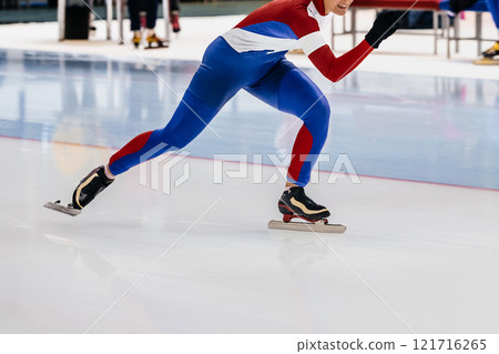 female athlete running sprint in speed skating competition 121716265