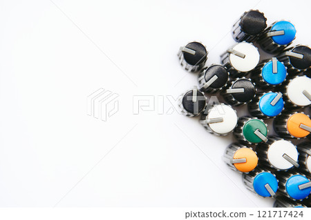 Music store.Buttons potentiometers for volume and frequencies of mixer Music store.Buttons potentiometers for volume and frequencies of mixer 121717424