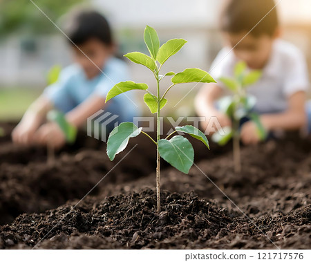 Children planting trees in soil, learning about nature and growth 121717576