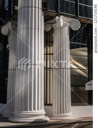 The morning light shining through Classic pillars detail of Modern building. 121719146
