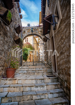 Narrow street in Ulcinj Old Town in Montenegro, the southernmost city at Montenegrin coast, Europe Narrow street in Ulcinj Old Town in Montenegro, the southernmost city at Montenegrin coast, Europe 121719445