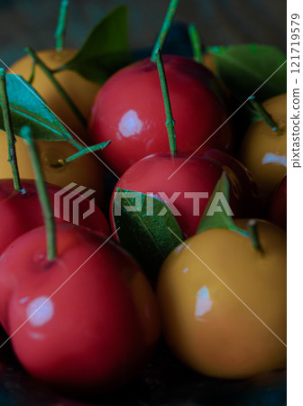 Deletable imitation fruits (Kanom look choup) has a sweet taste. 121719579