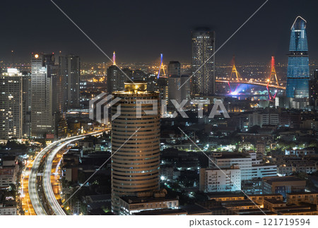 Nightscape view after sunset of Skyscrapers in the business district and Bhumibol Bridge. Nightscape view after sunset of Skyscrapers in the business district and Bhumibol Bridge. 121719594