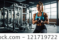 A female bodybuilder working out in a modern gym, exuding strength and focus. 121719722