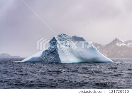 Iceberg drifting off the coast of South Georgia. Antarctica. Iceberg drifting off the coast of South Georgia. Antarctica. 121720910