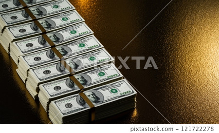 Bundles of Dollars on a Luxurious Gold Background Bundles of Dollars on a Luxurious Gold Background 121722278