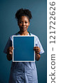 Medical Worker Holding a Poster 121722626