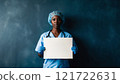 Medical Worker Holding a Poster 121722631