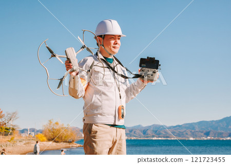 Workers flying drones 121723455