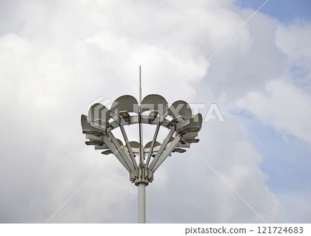 lighting lantern with many light bulbs against the backdrop of a large cloud lighting lantern with many light bulbs against the backdrop of a large cloud 121724683