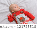 Baby Boy in a Christmas Outfit on a Light Background. Selective Focus 121725518