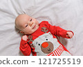 Baby Boy in a Christmas Outfit on a Light Background. Selective Focus 121725519