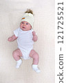 Baby Boy in a Christmas Outfit on a Light Background. Selective Focus 121725521