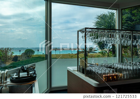 The beautiful ocean of Okinawa seen from the bar at Sheraton Okinawa Sunmarina Resort in Onna Village, Okinawa Prefecture 121725533