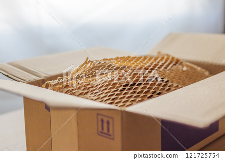 Eco friendly brown paper honeycomb wrap for product packaging parcel carton box 121725754