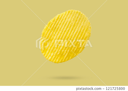 potato chip isolated on yellow background potato chip isolated on yellow background 121725800
