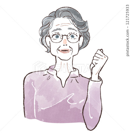 Senior woman with permed hair gives a fist pump 121725933