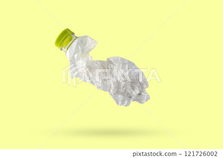 recycled plastic bottle isolated on green background 121726002