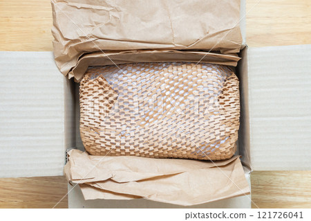 Eco friendly brown paper honeycomb wrap for product packaging parcel carton box Eco friendly brown paper honeycomb wrap for product packaging parcel carton box 121726041
