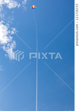 Okinawa's beautiful blue sky, blue sea, and winter kite flying on the beach (Western kites) Okinawa's beautiful blue sky, blue sea, and winter kite flying on the beach (Western kites) 121726155