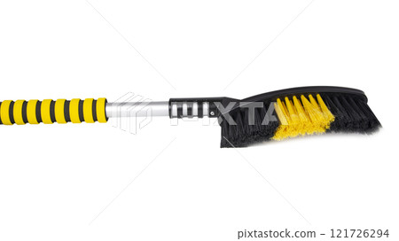 Winter car brush for removing snow plastic scrapper isolated on the white Winter car brush for removing snow plastic scrapper isolated on the white 121726294