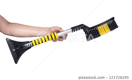 Winter car brush for removing snow plastic scrapper isolated on the white Winter car brush for removing snow plastic scrapper isolated on the white 121726295