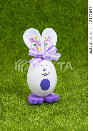 Easter toy bunny egg on green grass bright holiday 121726454
