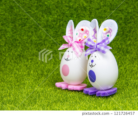 Easter handmade toy bunny egg no trademark on green grass bright holiday 121726457