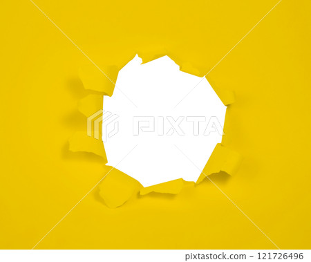 Orange paper with hole isolated background with copy space 121726496