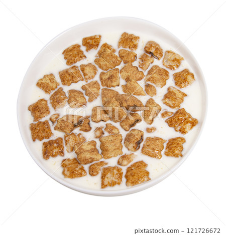 Crispy pads chocolate pillows with milk in dish isolated on the white background Crispy pads chocolate pillows with milk in dish isolated on the white background 121726672