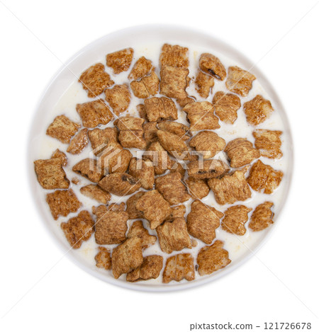 Crispy pads chocolate flakes in milk isolated on the white background Crispy pads chocolate flakes in milk isolated on the white background 121726678
